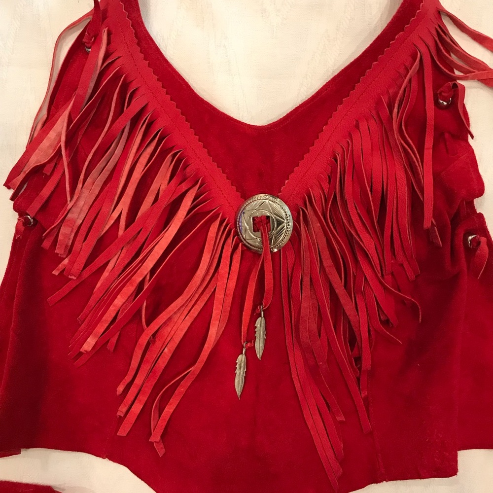 Suede fringed top.